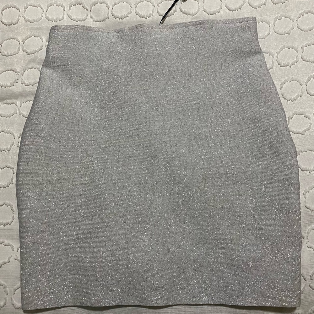Never been worn. Tags still on but cut out of picture. Wrong size for me.
